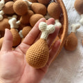 Crocheted plush chicken leg pendant key chain measuring 8cm in length.