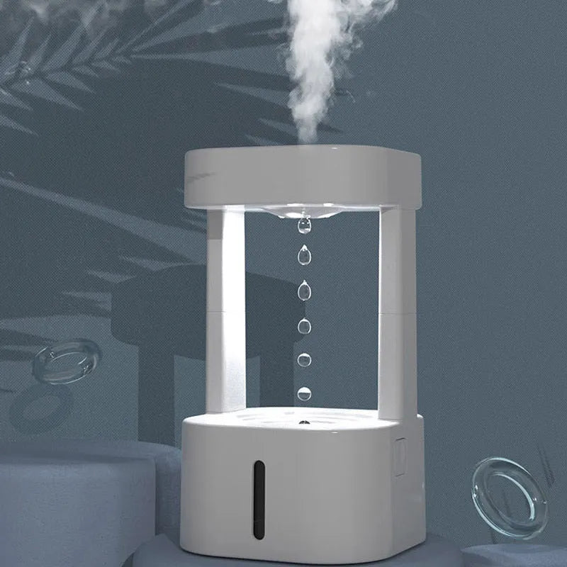 Desk humidifier with raining cloud design, essential oil diffuser, and mushroom lamp night light