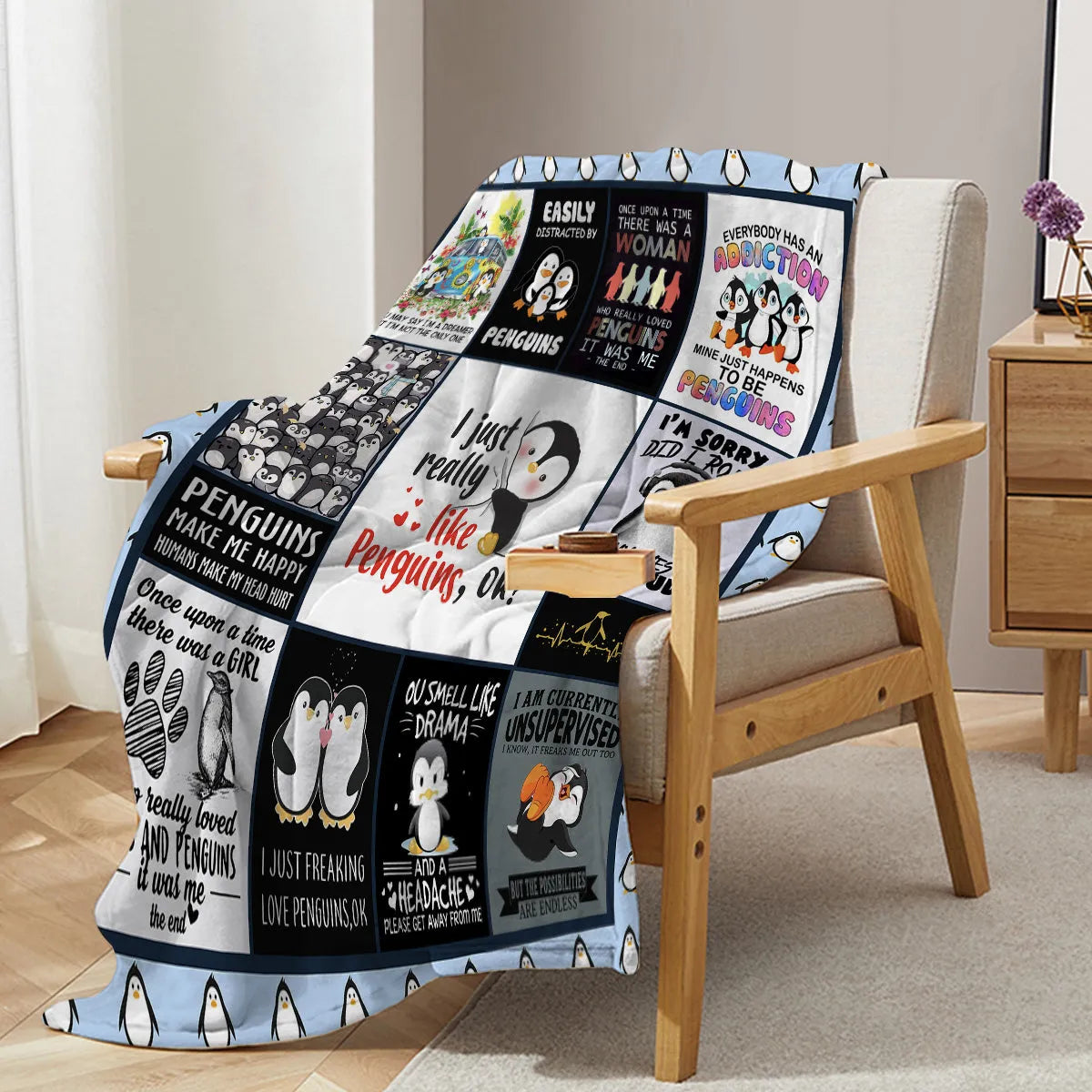 Multicoloured flannel throw blanket with penguin patterns, 130x150cm size on a sofa