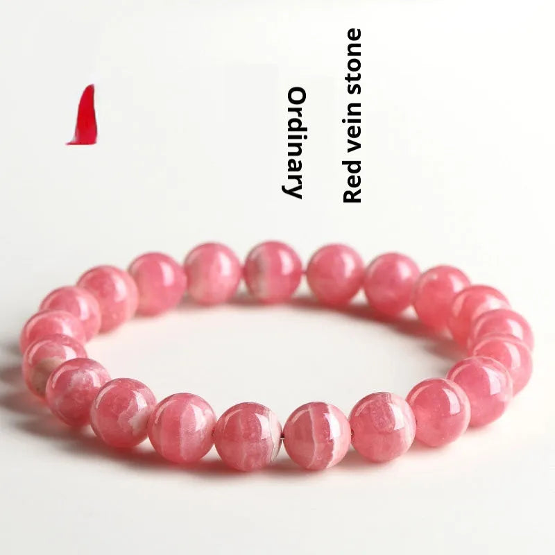 Women's geometric rhodochrosite crystal bracelet with a longevity lock in various bead sizes.