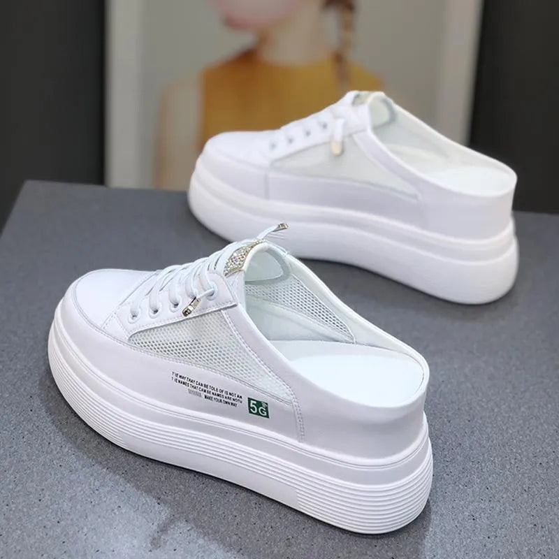 White women's platform sandals with mesh upper and round toe design
