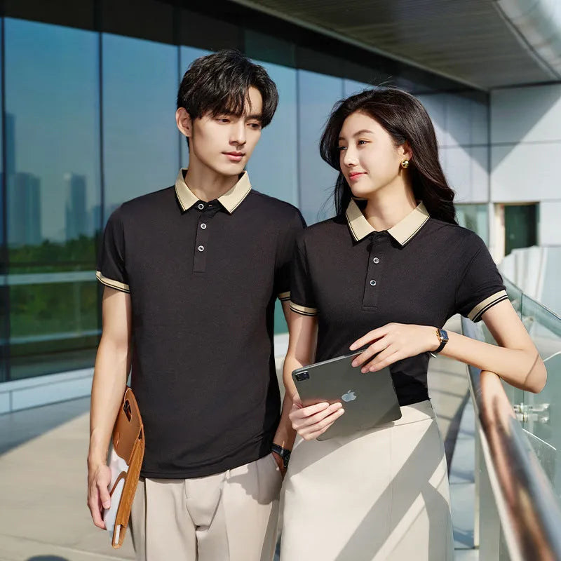 Solid colour summer polo shirt in cotton with short sleeves, loose fit, and slit detail on the side