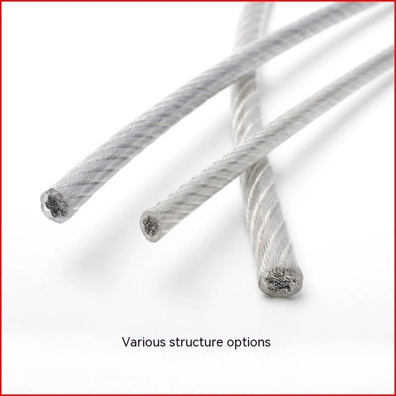 Close-up of a multi-strand 304 stainless steel anti-theft security cable coiled on a dark surface.