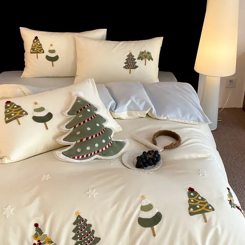 Cream blue duvet cover with raised towel embroidery Christmas tree design, part of a pure cotton four-piece bedding set.