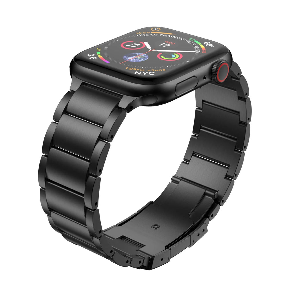 Black titanium metal band with folding buckle for Apple Watch on a grey background