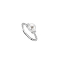 Adjustable antique-finish copper ring with a 6mm pearl set in a geometric twist.