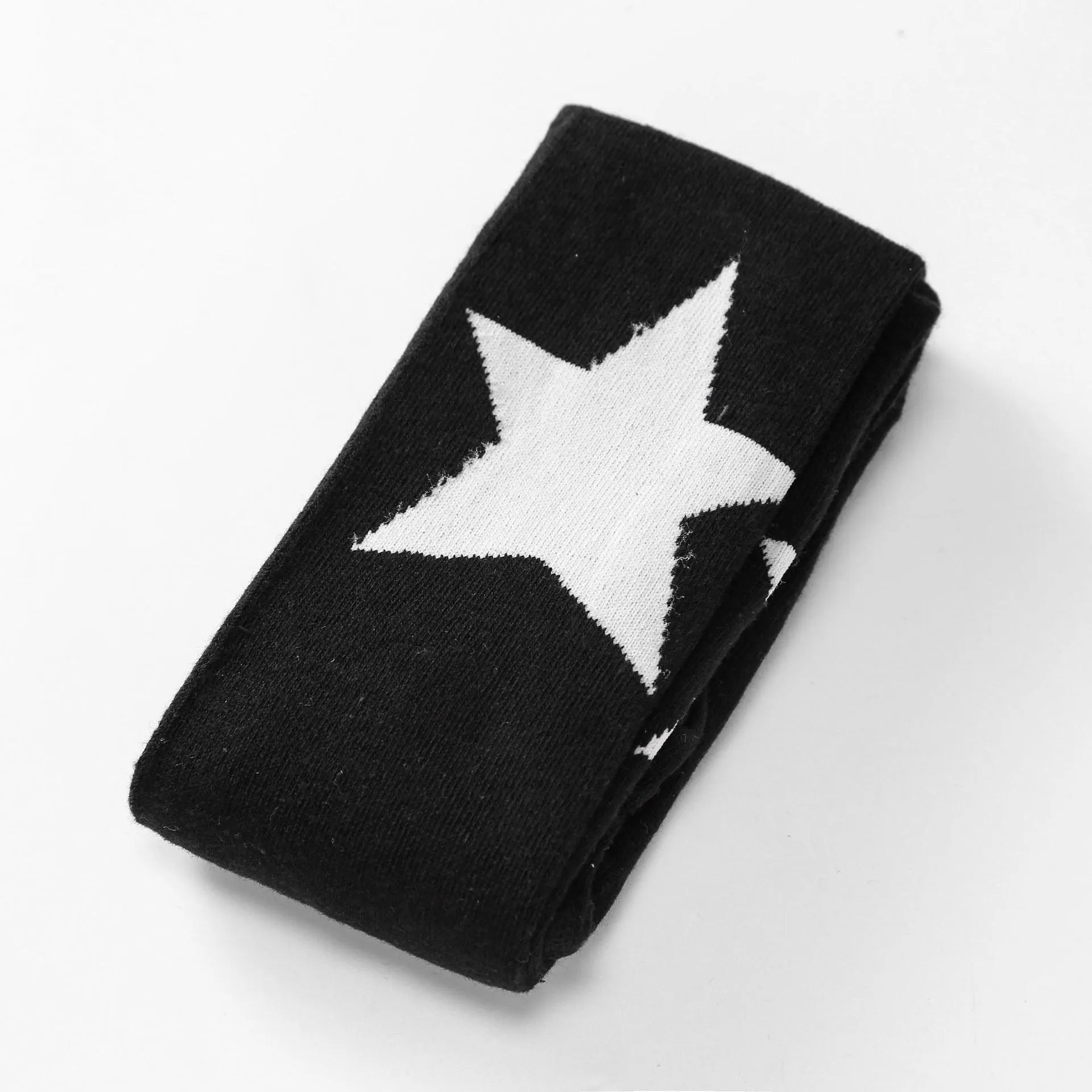 Girl's cotton leggings with five-pointed star and heart patterns in solid colour design