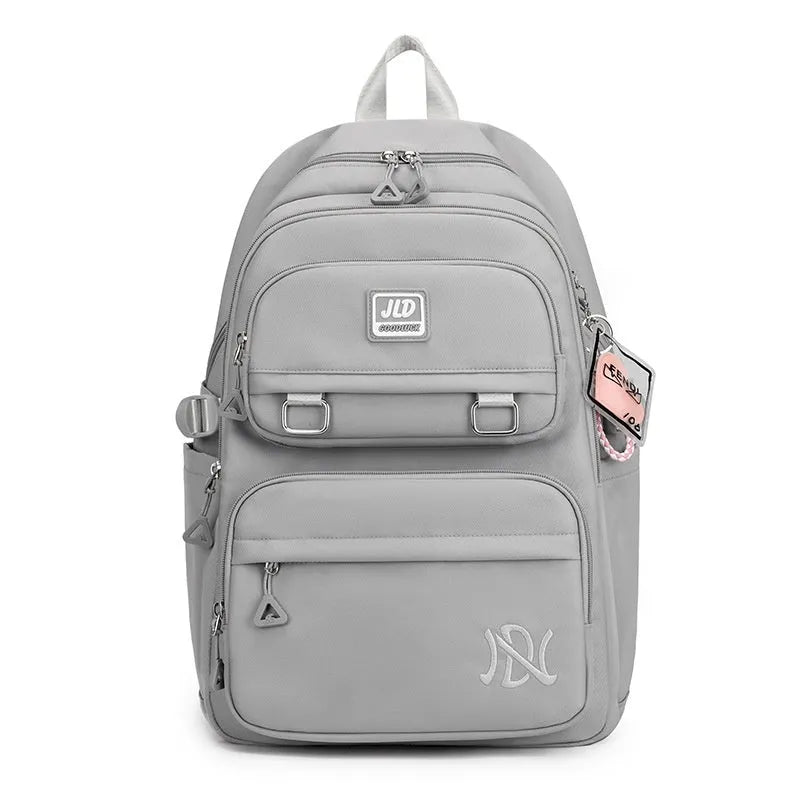Large capacity nylon school backpack for girls in a choice of colours and geometric patterns.