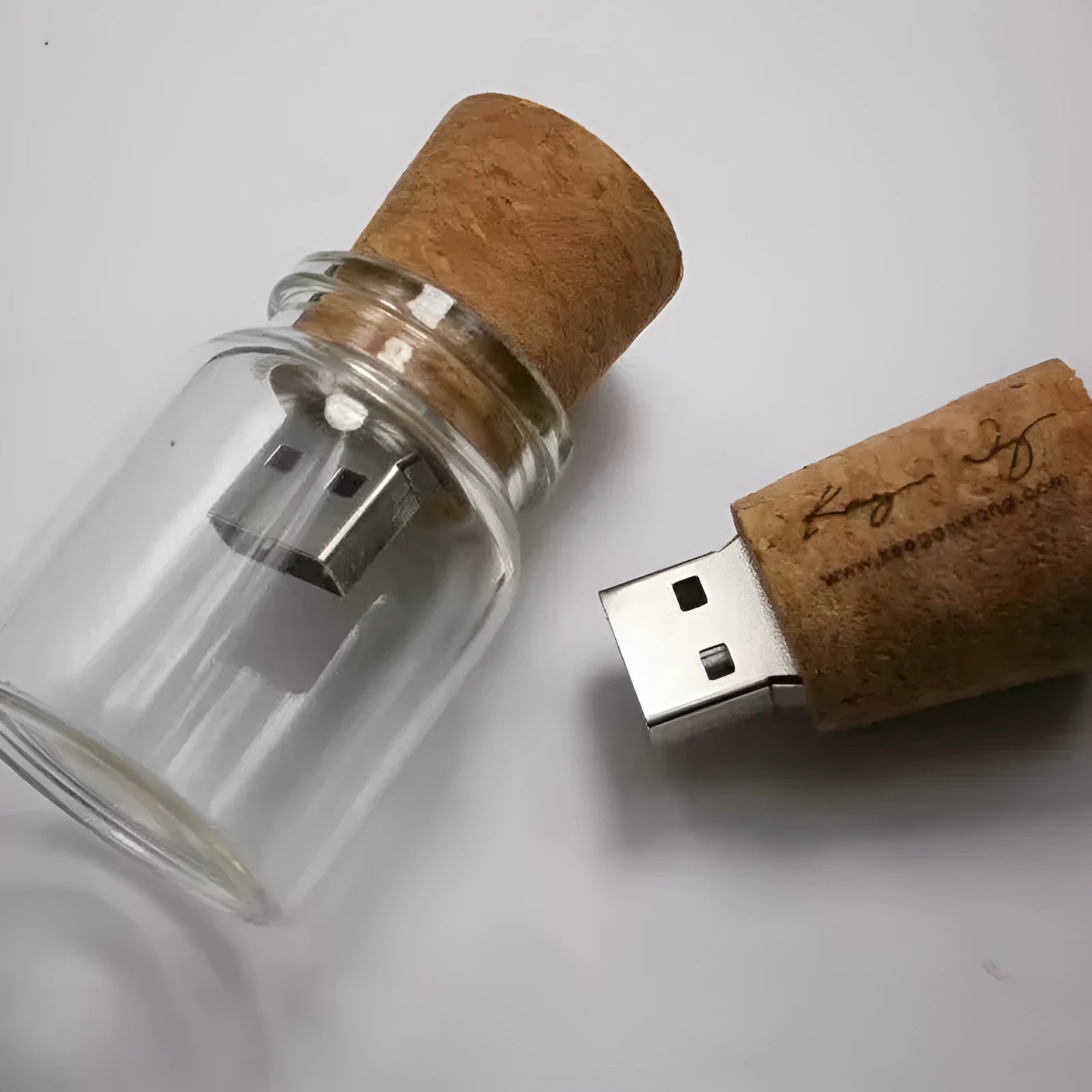 Wooden wish drift bottle USB flash drive with transparent plastic case showing carved wood inside.