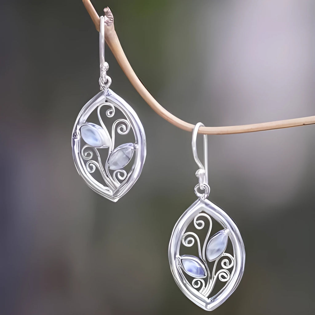 Silver alloy leaf earrings with embedded colourful moonstone, diamond cut treatment details