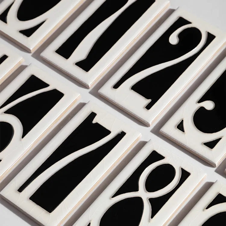 Handmade retro-style ceramic doorplate with white enamel number on blue background, dimensions 76mm by 152mm.