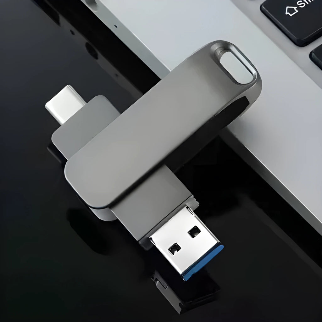 Rotating metal USB flash drive showing USB and USB-C connectors with black finish and protective iron box packaging