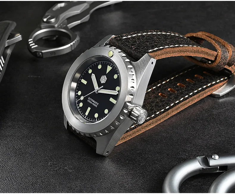Men's stainless steel automatic diving watch with black dial, green luminous markers, leather strap, 41mm case, 200m water resistant