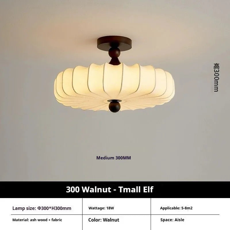Mid-ancient French retro fabric ceiling lamp with ash wood frame in walnut colour on a ceiling