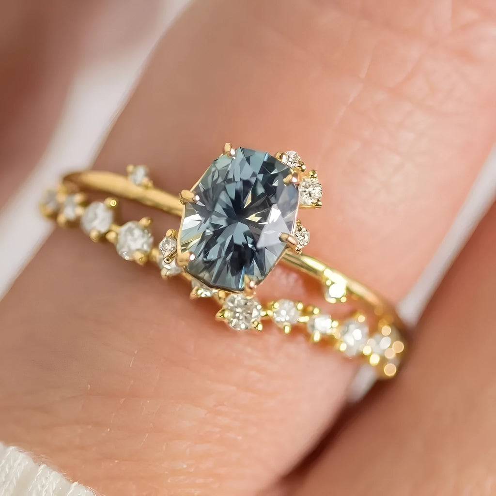 Gold-plated women's ring with green zircon stone in floral design on finger
