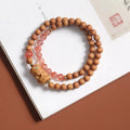 Brown wooden bracelet with double circle design featuring 6mm round beads in traditional weaving style