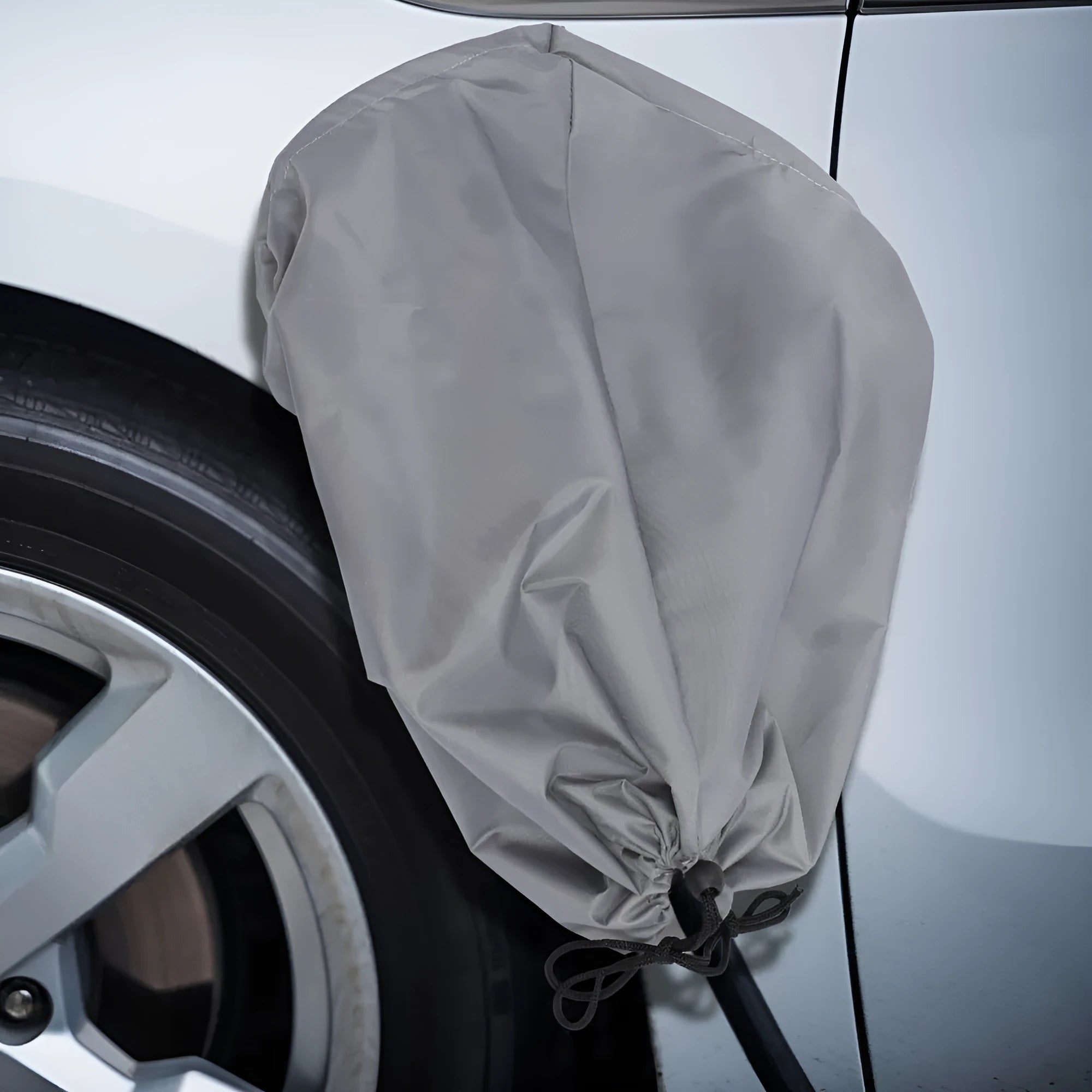 New energy vehicle charging waterproof cover in grey showing drawstring design