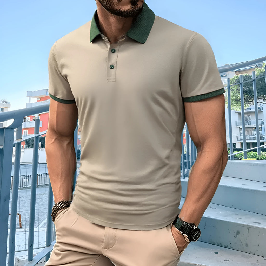 Men's green summer polo shirt with short sleeves and a black flocking design on the front.