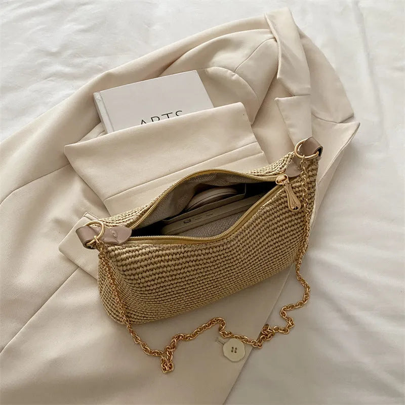 Women's woven straw crossbody bag with internal phone compartment in black, khaki, or white