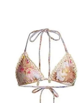 Women's creamy-white floral bikini swimsuit with separate top, underwear, and skirt pieces