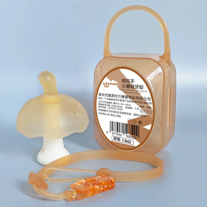 Small pink and clear mushroom-shaped silicone chew with transparent storage box and nano chain.
