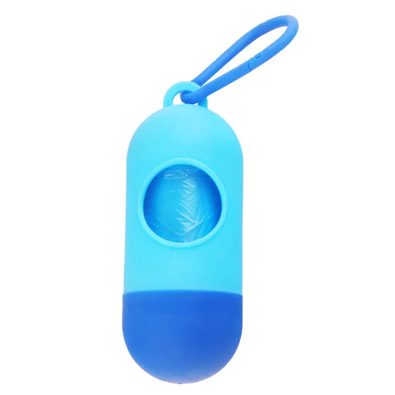 Black dog poop bag holder with side hook and Velcro closure, showing compact size.