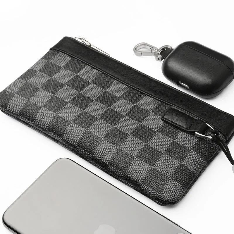 Black men's leather clutch wallet showing front view and open interior with polyester lining.