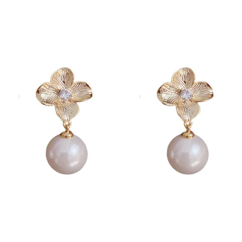 Women's gold plated copper floral drop earrings with faux pearl and metal petals simple style