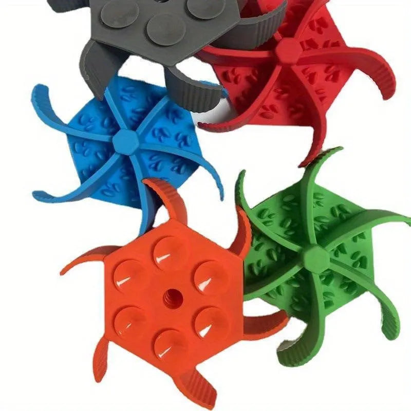 Blue silicone pet slow feeder licking pad with suction cup base for dogs and cats.