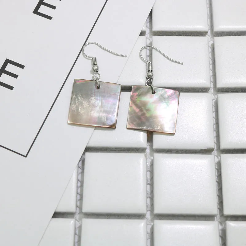 Geometric shell earrings for women in rectangular shell and square panther designs with retro natural styling