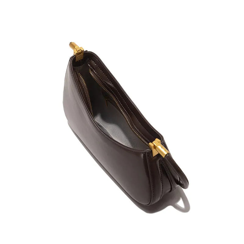 Women's oval retro underarm bag in PU leather with single shoulder strap and zipped compartment