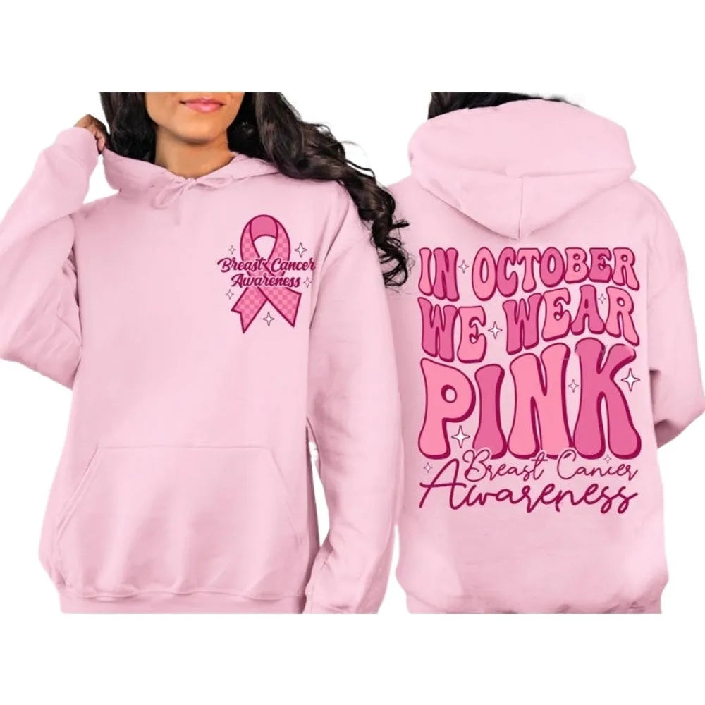 Pink breast cancer awareness pullover hoodie with retro hot stamp design and side pockets.