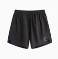 Black running shorts with laser-punched stitching on a manikin, showing stretch fabric for training.