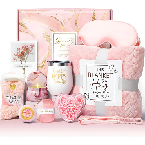 Modern plastic box containing an aromatherapy gift set with scented candles and soap bars.