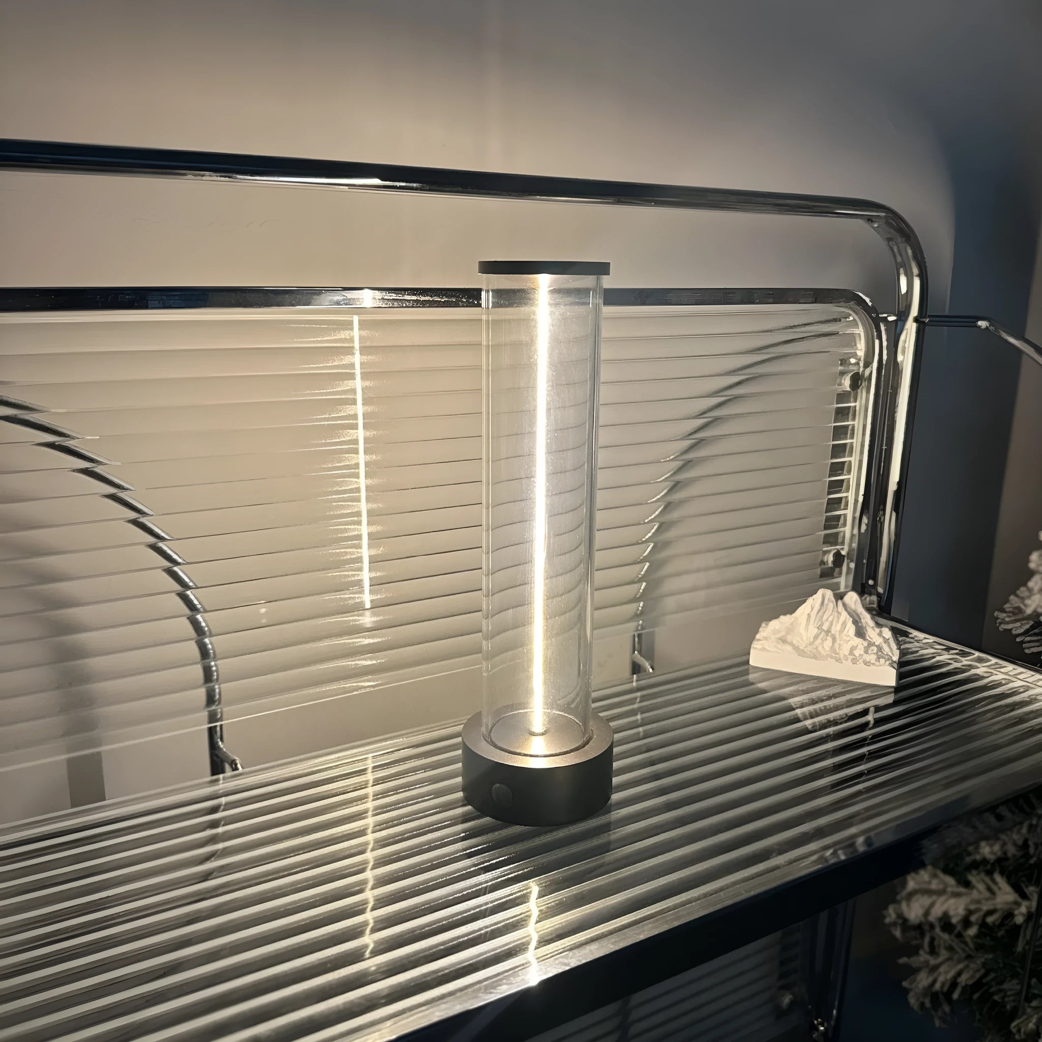 Modern linear glass USB LED night light strip with magnetic adhesive base.