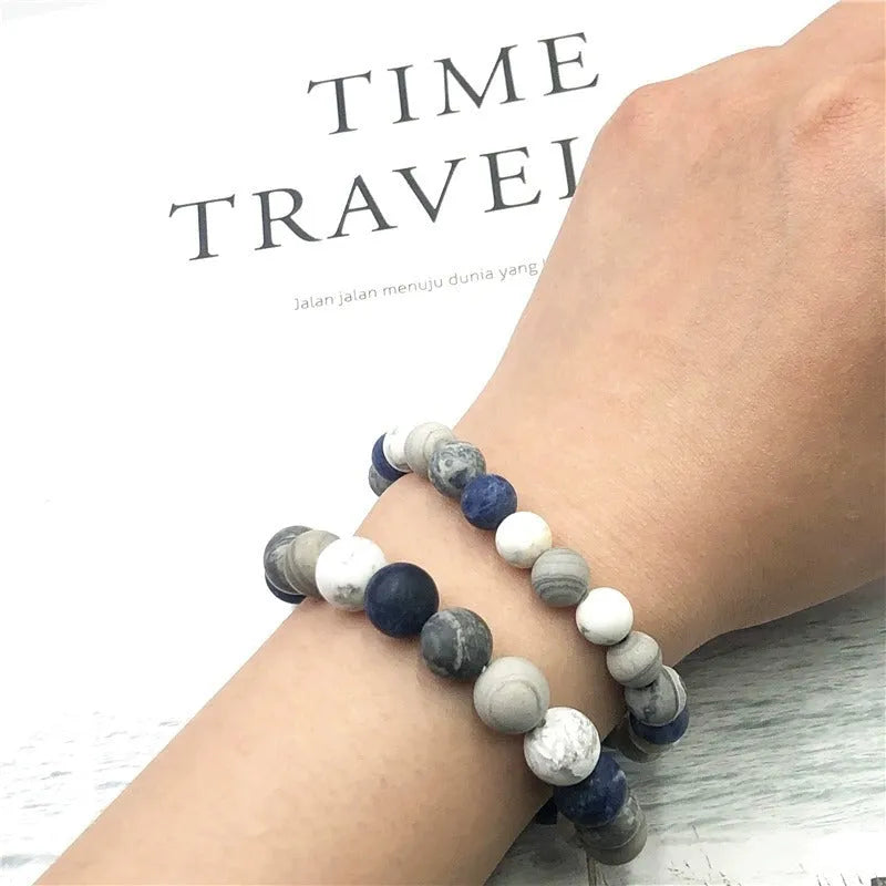 Handmade men's planet stone bracelet with starry sky beads in a U-shaped design.