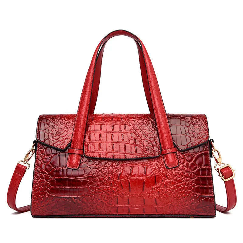 Soft leather messenger bag in horizontal square design with single shoulder strap
