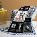 Multicoloured flannel throw blanket with penguin patterns, 130x150cm size on a sofa