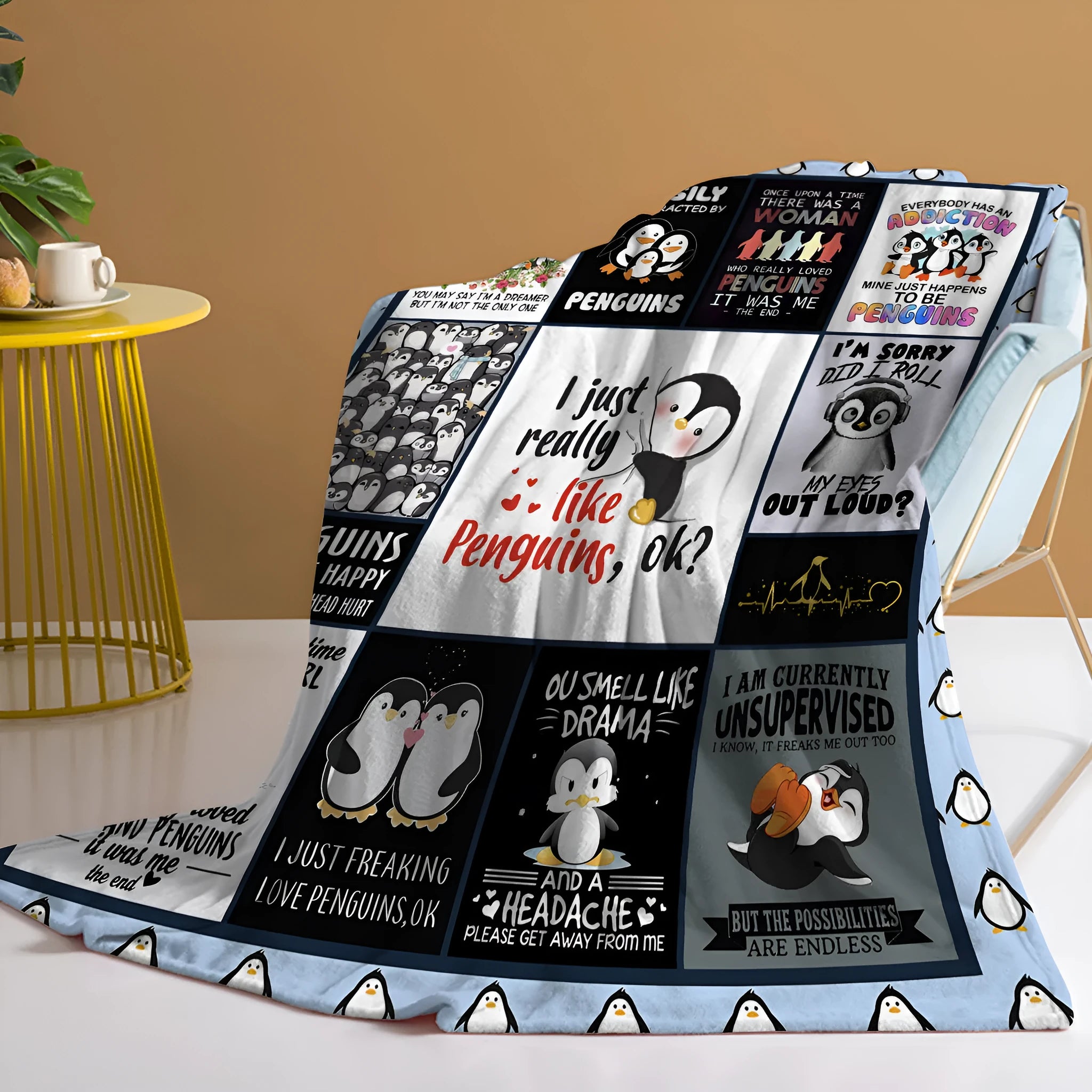 Multicoloured flannel throw blanket with penguin patterns, 130x150cm size on a sofa