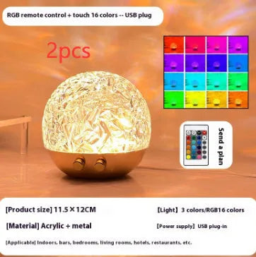 Water ripple projector night light with crystal-like acrylic body and colourful ripple patterns on a bedside table