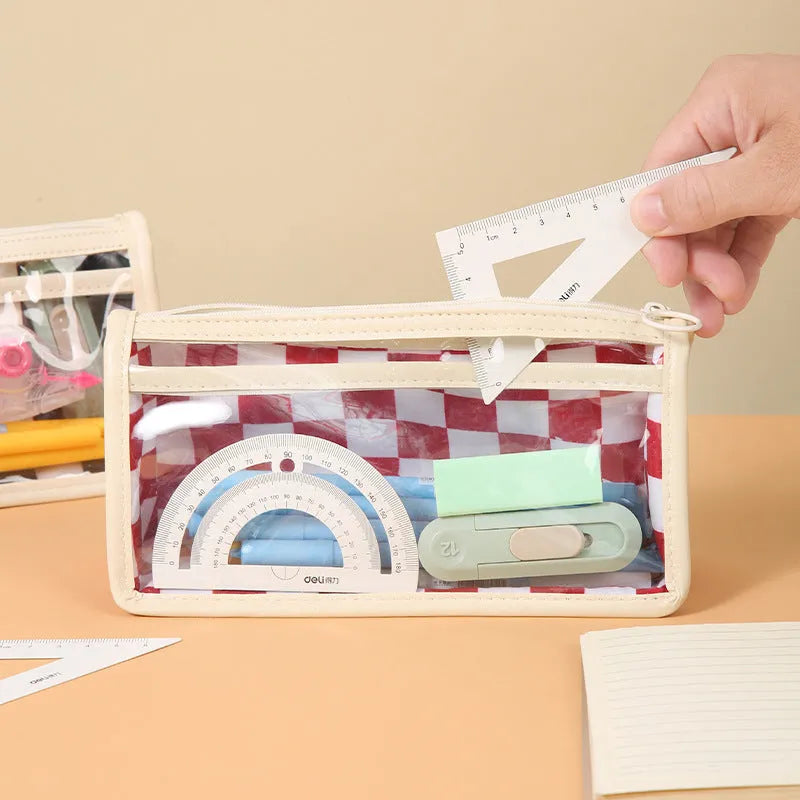 Transparent PVC pencil case with a chessboard grid pattern, showing pens inside, next to a red and white plaid version.