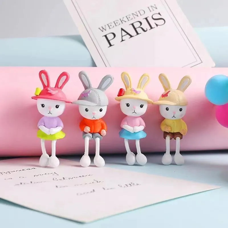 Cartoon rabbit car decoration set with four sitting rabbit figures in plain, pink flower, colourful balloon or travel balloon style