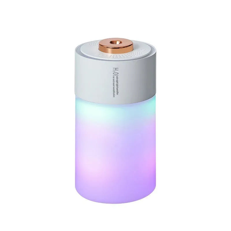 Homehold colourful USB humidifier in white columnar shape on a desk