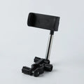 Black car phone holder mounted on rearview mirror showing 360-degree rotation mechanism