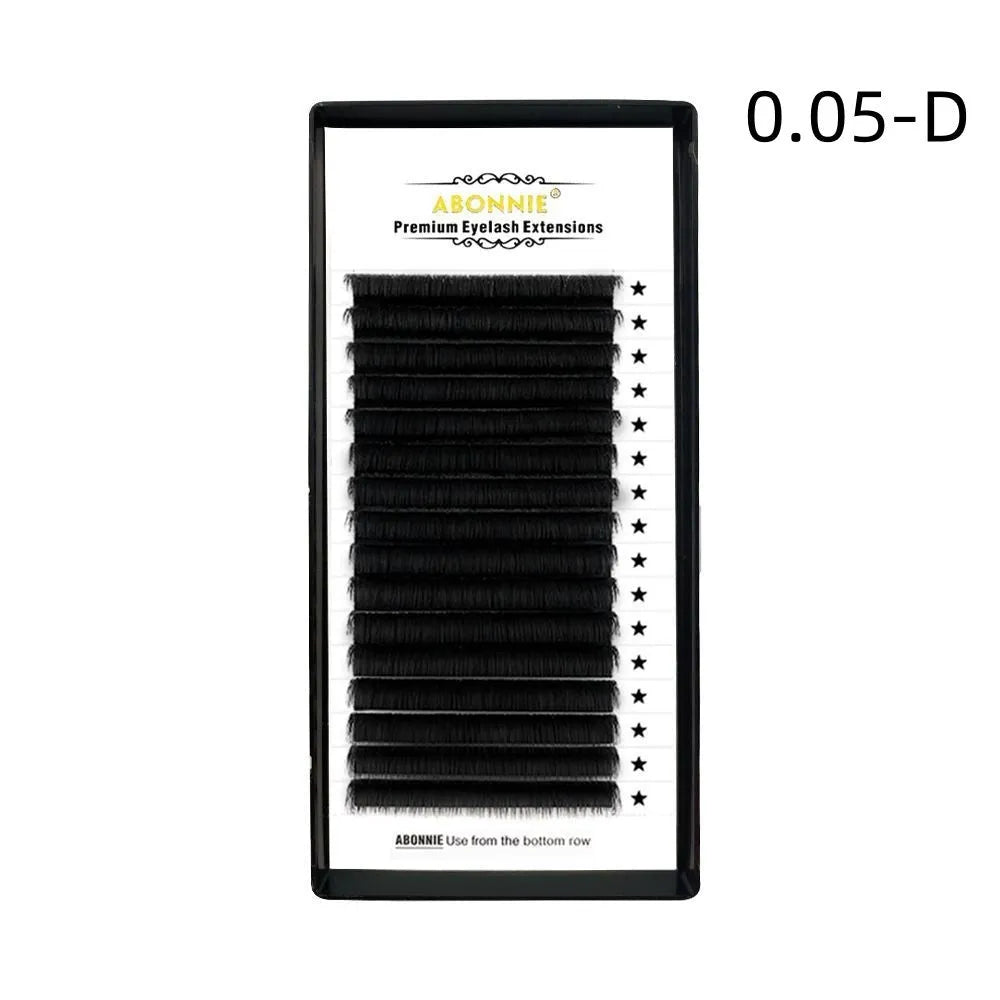 Close-up of 16-row dense mink hair false eyelashes on a matte round wool band.