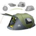 Dark green two-person pop-up camping tent showing automatic frame and waterproof rainfly