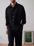 Black pinstriped men's button-down shirt with long sleeves and a regular fit.