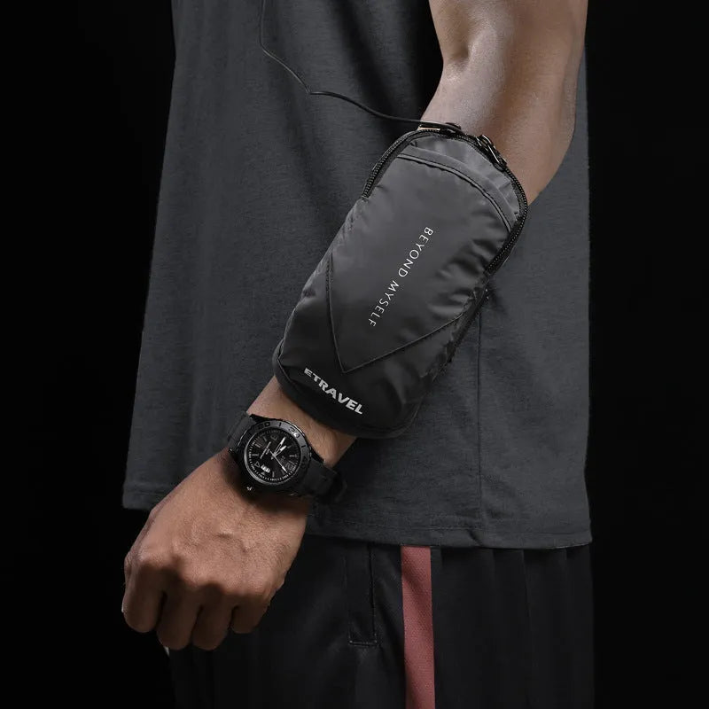 Black reflective running arm bag with adjustable strap, shown holding a smartphone, for outdoor sports safety.