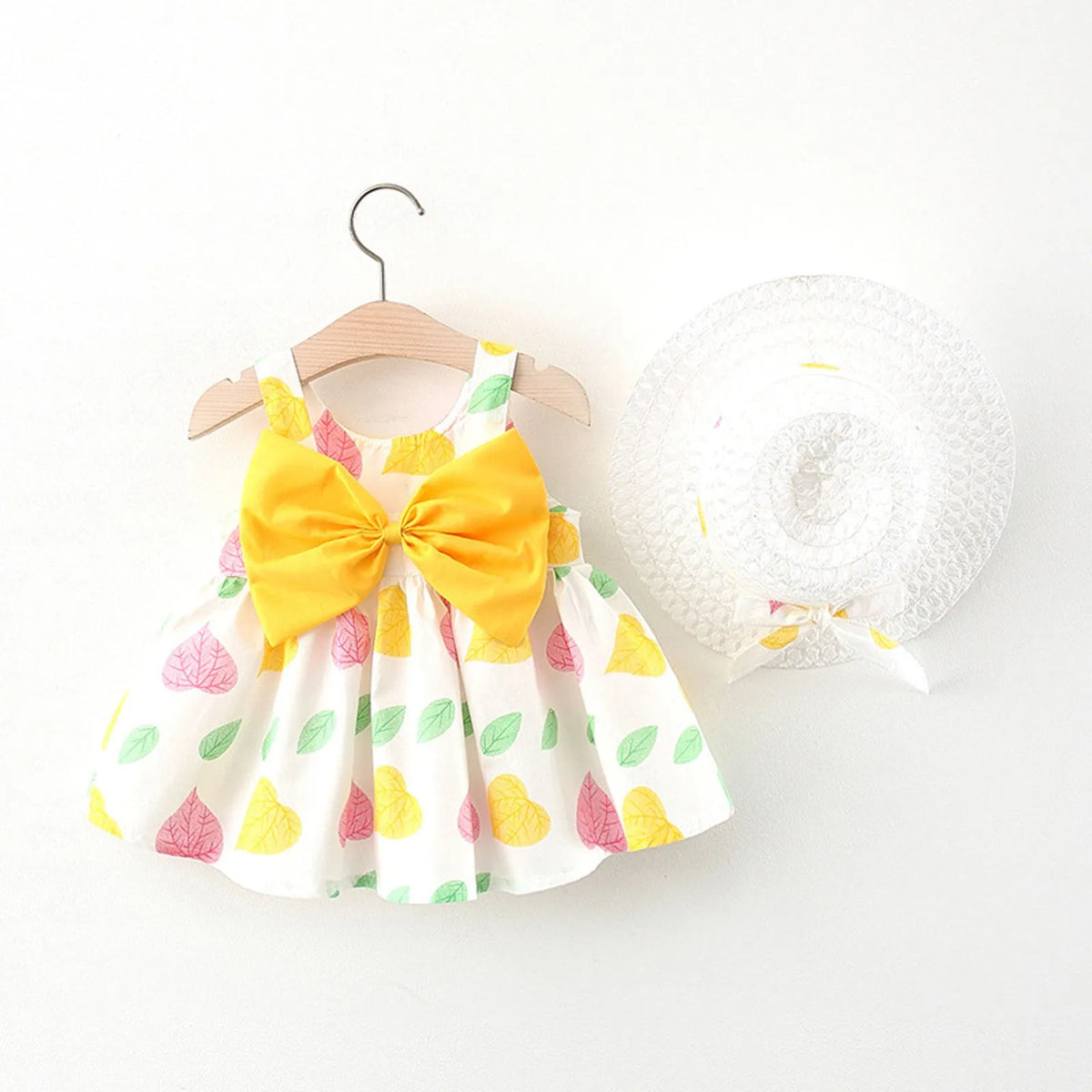 Baby girl cotton floral print bow suspender dress in yellow with matching hat