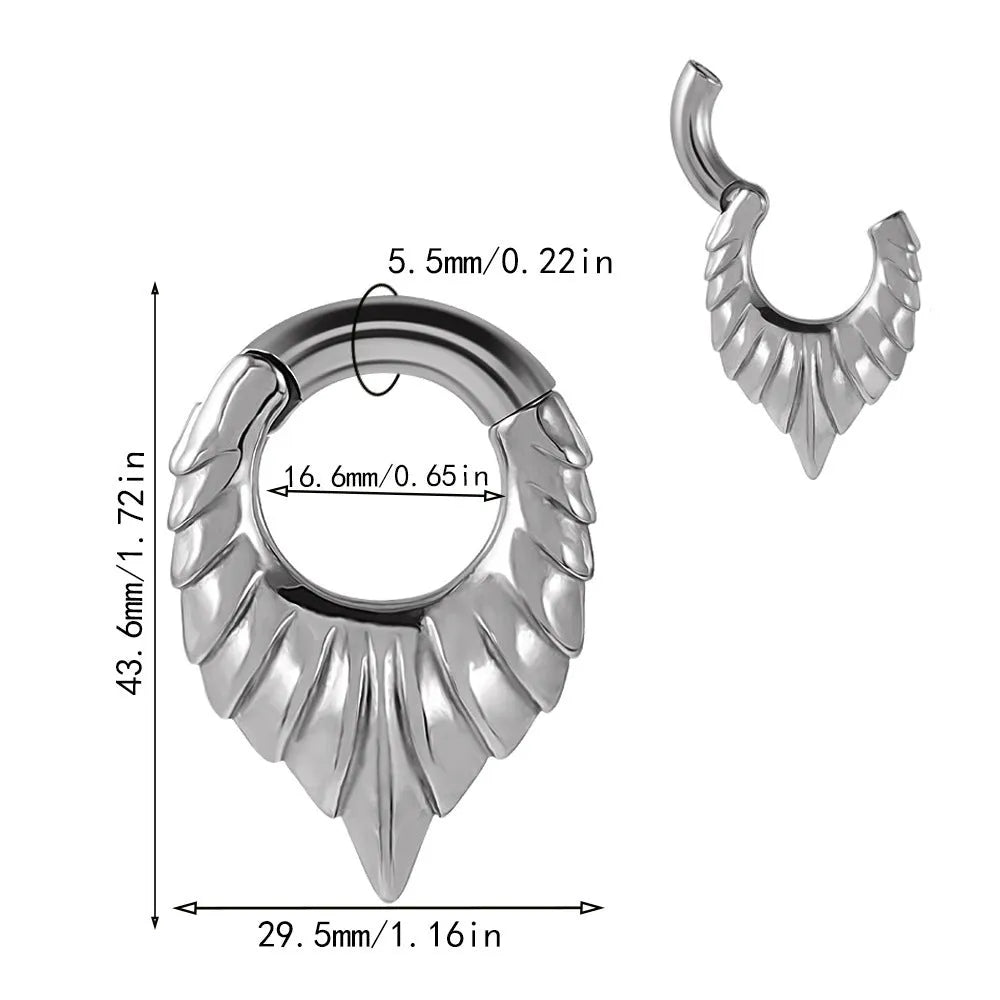 Silver stainless steel drop-shaped egg ear extender with totem engraving for cartilage piercing.